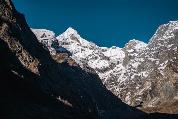 Mountain Landscapes - Captivating view of snow-covered mountain peaks  #12495915