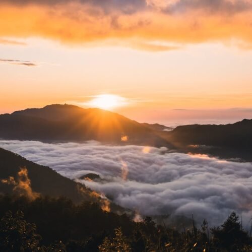 Mountain Landscapes - Captivating sunrise over mountain range with clo #13325395