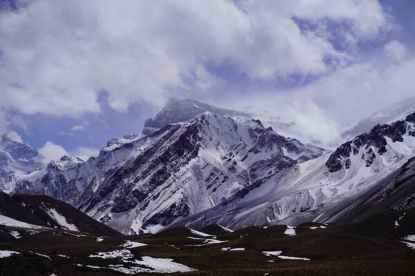 Snow Mountains - Experience the majestic snow-covered Andes Mount #13815606