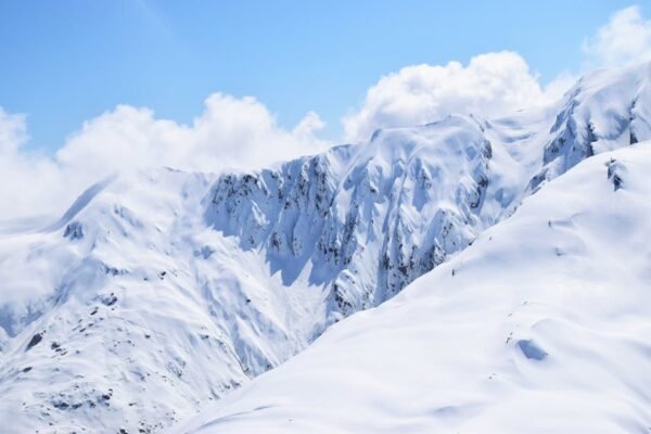 Snow Mountains - Stunning snowy mountains under a bright blue sky #140234