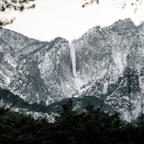 Snow Mountains - Experience the serene beauty of snow-covered mou #15443918