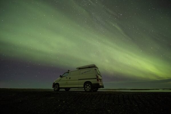 Mountain Landscapes - A camper van under the stunning aurora borealis  #17237090