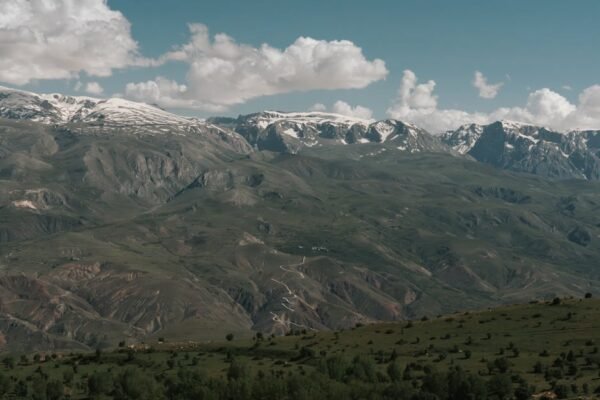 Snow Mountains - Scenic view of a vast mountain range featuring s #18864605