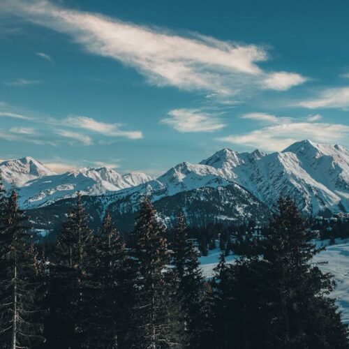 Snow Mountains - A stunning view of snow-capped mountains and pin #19393715