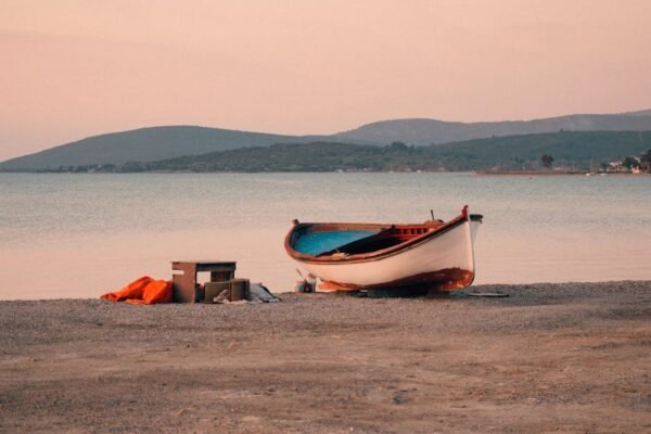 Beach Scenery - A serene boat scene on Urla's beach in İzmir, Tü #19887096