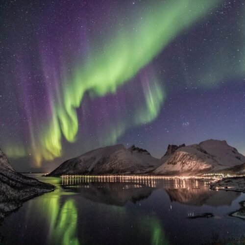 Lake Reflections - Beautiful aurora borealis over a snow-capped mou #2113566