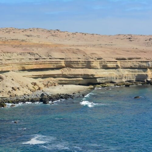 Beach Scenery - Breathtaking view of coastal cliffs with waves c #26752981