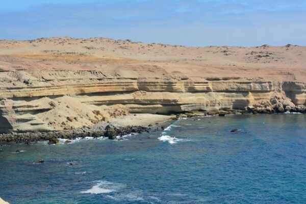 Beach Scenery - Breathtaking view of coastal cliffs with waves c #26752981