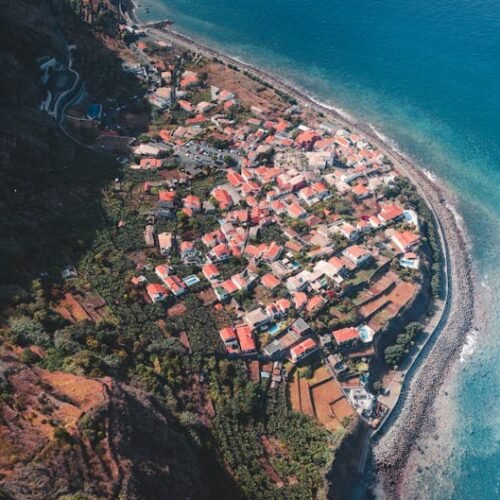 Forest Nature - Stunning aerial view of a coastal village in Mad #27429861