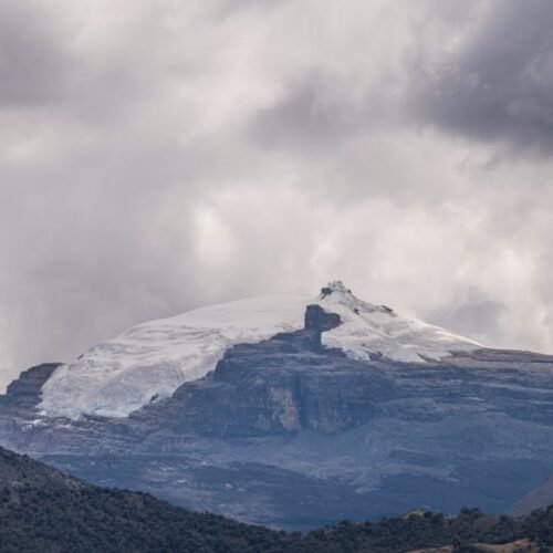 Snow Mountains - Breathtaking view of snowy peaks in El Cocuy Nat #27845433