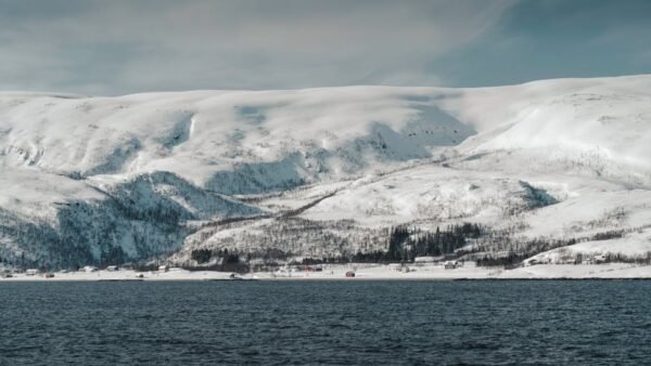 Snow Mountains - Tranquil view of snow-covered mountains near a f #29304806