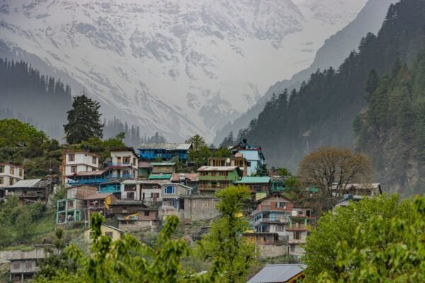 Snow Mountains - Scenic view of a colorful village in Manali with #31776512