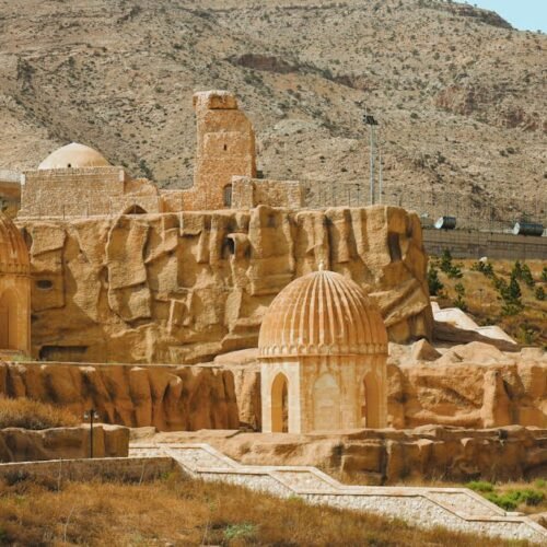 Desert Wilderness - Explore historic stone buildings amidst rugged h #32545587