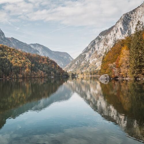 Mountain Landscapes - Tranquil autumn landscape of a mountain lake in  #34123121