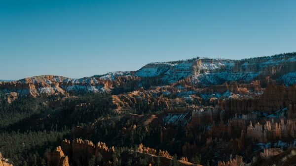 Desert Wilderness - Capture of the snow-dusted red rock formations i #34919357