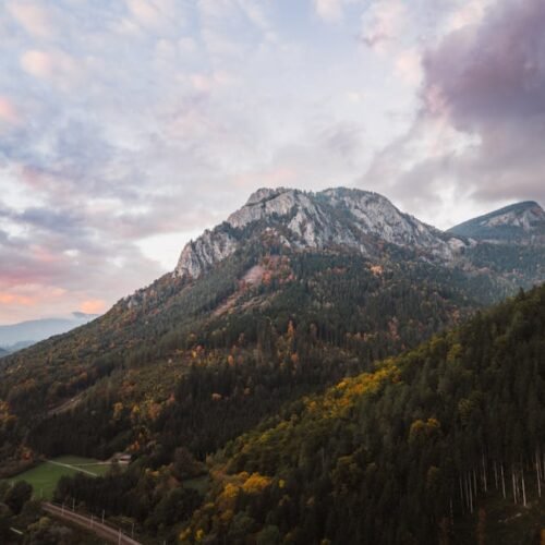 Mountain Landscapes - A breathtaking view of a mountain peak surrounde #35674498