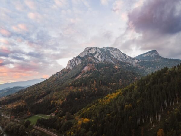 Mountain Landscapes - A breathtaking view of a mountain peak surrounde #35674498