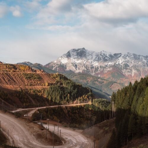 Mountain Landscapes - Breathtaking view of a winding road leading to s #36097627