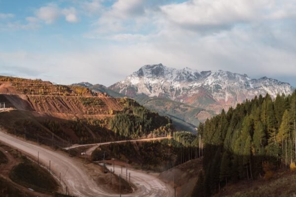 Mountain Landscapes - Breathtaking view of a winding road leading to s #36097627