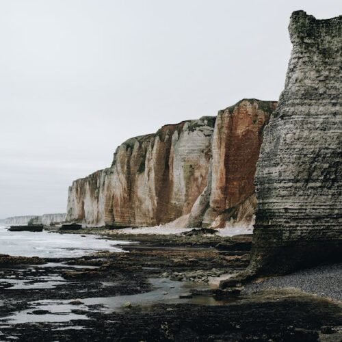 Beach Scenery - Stunning view of the iconic cliffs at Étretat, N #5421986