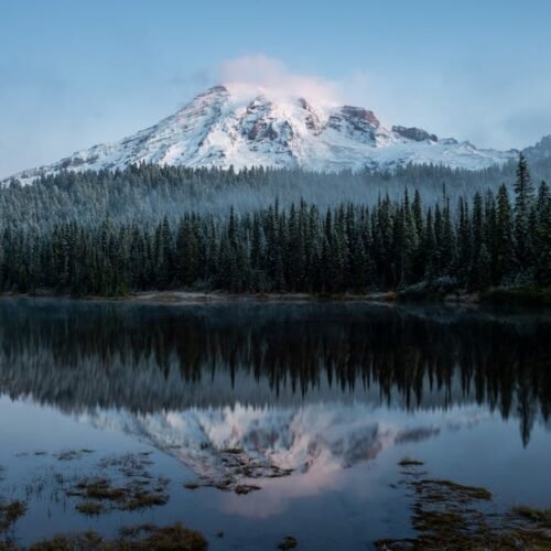 Mountain Landscapes - Mount Rainier reflecting in scenic lake with sno #5643454