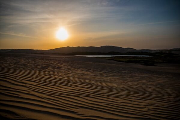 Desert Wilderness - Captivating sunset over desert dunes in Perú, sh #7333036