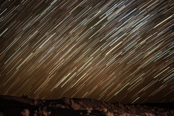 Desert Wilderness - Captivating long exposure of star trails over an #7459817