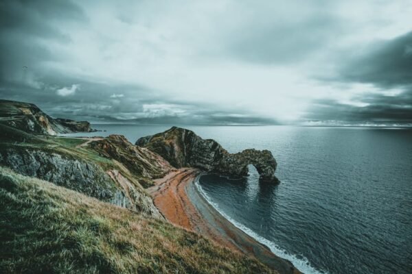 Beach Scenery - Scenic view of Durdle Door arch along the Jurass #8567869