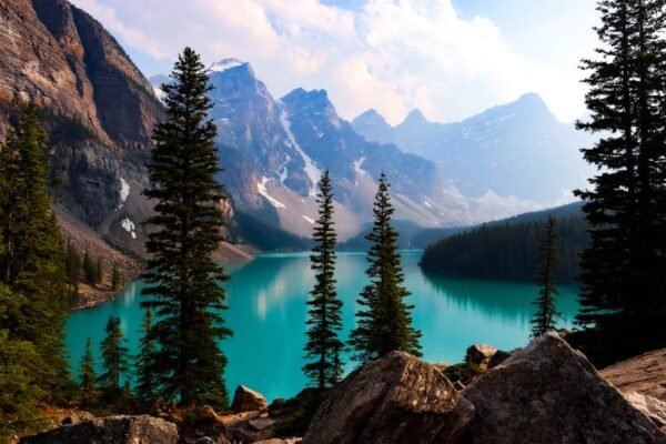 Lake Reflections - Breathtaking view of Moraine Lake with turquoise #9750174